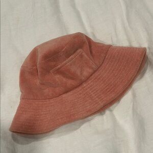 Lack of color, pink bucket hat